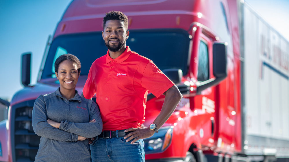 couple of drivers in front of truck