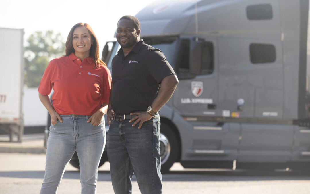 U.S. Xpress drivers at dedicated trucking site